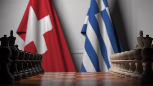 Flagi Szwajcarii i Grecji za pionkami na szachownicy. Gra w szachy lub rywalizacja polityczna związana z animacją 3D — Wideo stockowe