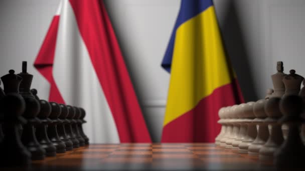 Bandiere di Austria e Romania dietro pedoni sulla scacchiera. Gioco di scacchi o rivalità politica relativi animazione 3D — Video Stock