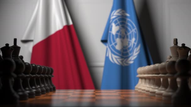 Drapeaux de Malte et des Nations Unies derrière des pions sur l'échiquier. Animation 3D éditoriale conceptuelle — Video