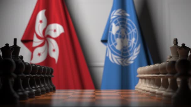 Bendera Hong Kong dan Perserikatan Bangsa-Bangsa di belakang pion di papan catur. Animasi 3D konseptual — Stok Video