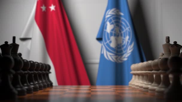 Bandeiras de Singapura e Nações Unidas atrás de peões no tabuleiro de xadrez. Animação conceitual editorial 3D — Vídeo de Stock