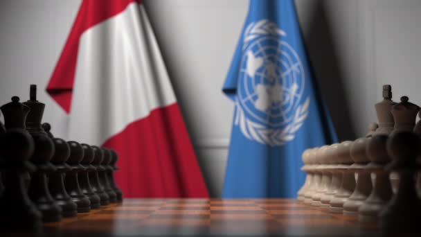 Banderas del Perú y las Naciones Unidas detrás de peones en el tablero de ajedrez. Editorial conceptual Animación 3D — Vídeo de stock