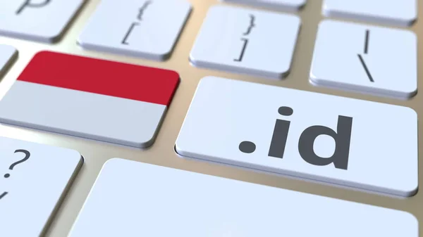 Indonésio domínio .id e bandeira da Indonésia nos botões no teclado do computador. Renderização 3D relacionada à internet nacional — Fotografia de Stock