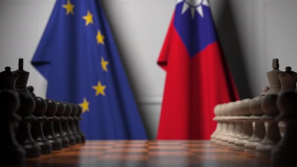 Vlaggen van Europa en Taiwan achter pionnen op het schaakbord. Schaakspel of politieke rivaliteit gerelateerde 3D-animatie — Stockvideo