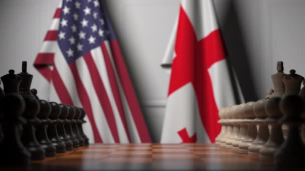 Banderas de EE.UU. y Georgia detrás de peones en el tablero de ajedrez. Juego de ajedrez o rivalidad política relacionada con la animación 3D — Vídeo de stock
