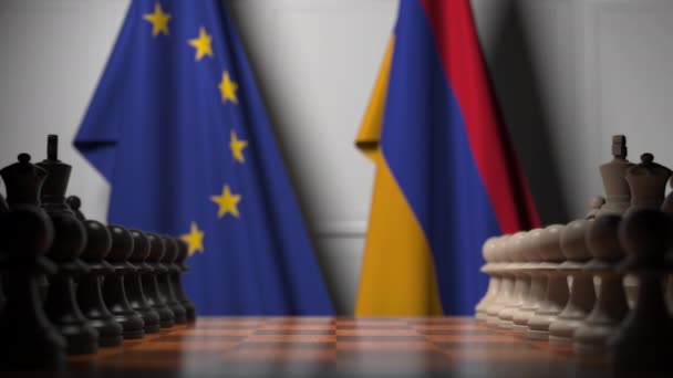 Bandiere dell'UE e dell'Armenia dietro pedine sulla scacchiera. Gioco di scacchi o rivalità politica relativi animazione 3D — Video Stock