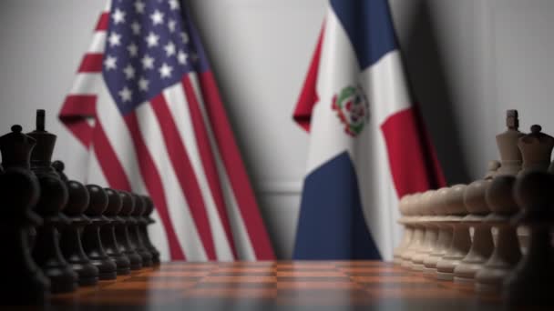 Usa和多米尼加共和国的国旗在棋盘上的棋子后面。 棋类游戏或政治竞争相关3D动画 — 图库视频影像