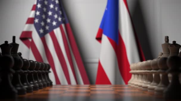 Drapeaux des États-Unis et Porto Rico derrière des pions sur l'échiquier. Jeu d'échecs ou rivalité politique liée à l'animation 3D — Video