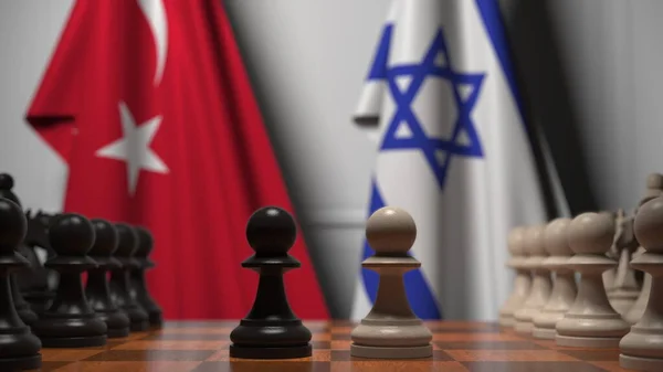 Bandiere di Turchia e Israele dietro pedine sulla scacchiera. Rendering 3D relativo alla partita a scacchi o alla rivalità politica — Foto Stock