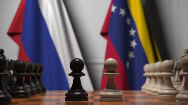 Drapeaux de la Russie et du Venezuela derrière pions sur l'échiquier. Jeu d'échecs ou rivalité politique liée au rendu 3D — Photo