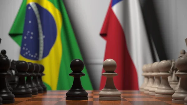 棋盘上的棋子后面挂着巴西和智利的国旗。 棋类游戏或政治竞争相关3D渲染 — 图库照片