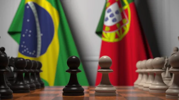 Bandeiras do Brasil e Portugal atrás de peões no tabuleiro de xadrez. Jogo de xadrez ou rivalidade política relacionada com a renderização 3D — Fotografia de Stock