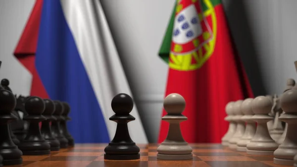 Oroszország és Portugália zászlói gyalogok mögött a sakktáblán. Sakk játék vagy politikai rivalizálás kapcsolódó 3d renderelés — Stock Fotó
