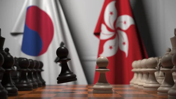 Flagi Korei i Hong Kongu za pionkami na szachownicy. Gra w szachy lub rywalizacja polityczna związana z renderowaniem 3D — Zdjęcie stockowe