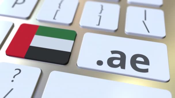 Domain .ae και σημαία Uae στα πλήκτρα του πληκτρολογίου του υπολογιστή. Εθνική σύνδεση στο διαδίκτυο 3d animation — Αρχείο Βίντεο