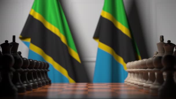 Schackspel mot flaggor i Tanzania. Politisk konkurrens relaterad 3D-animation — Stockvideo
