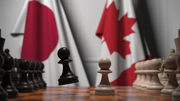 일본 과 캐나다의 국기에 대항하는 체스 게임. 3 차원 렌더링 과 관련된 정치적 경쟁 — 스톡 사진