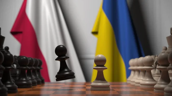 Banderas de Polonia y Ucrania detrás de peones en el tablero de ajedrez. Juego de ajedrez o rivalidad política relacionada con la representación 3D — Foto de Stock