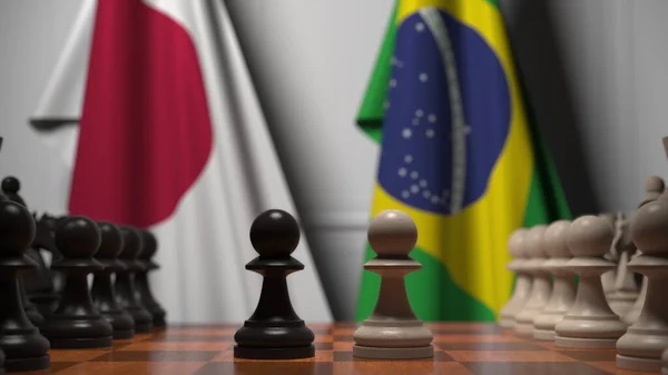Partita a scacchi contro le bandiere di Giappone e Brasile. Rendering 3D correlato alla competizione politica — Foto Stock