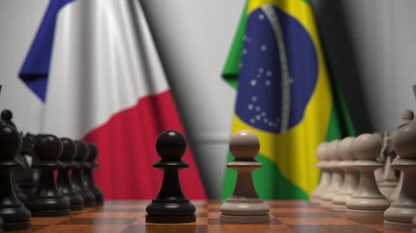 Sakk játék ellen zászlók Franciaország és Brazília. Politikai versennyel kapcsolatos 3d tetemeltakarítás — Stock Fotó