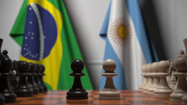 Banderas de Brasil y Argentina detrás de peones en el tablero de ajedrez. Juego de ajedrez o rivalidad política relacionada con la representación 3D —  Fotos de Stock