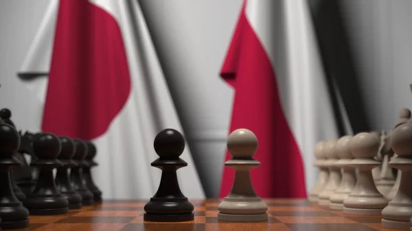 Flagi Japonii i Polski za pionkami na szachownicy. Gra w szachy lub rywalizacja polityczna związana z renderowaniem 3D — Zdjęcie stockowe