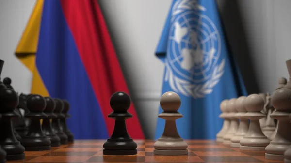 Σημαίες της Αρμενίας και των Ηνωμένων Εθνών πίσω από πιόνια στη σκακιέρα. Εννοιολογική σύνταξη 3d απόδοση — Φωτογραφία Αρχείου
