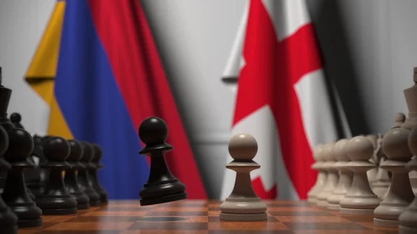 체스 판에 있는 양동 이 뒤에 있는 아르메니아와 조지아의 깃발. 체스 게임이나 정치적 라이벌은 3D 렌더링 과 관련 이 있다. — 스톡 사진