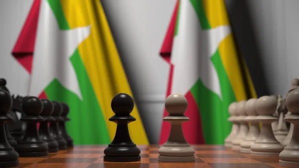 Jeu d'échecs contre les drapeaux du Myanmar. Compétition politique liée au rendu 3D — Photo