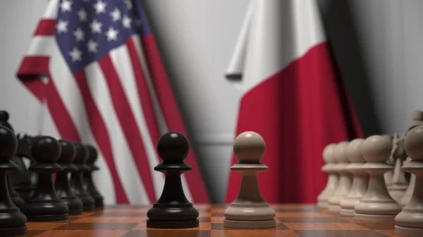 Прапори Уси і Мальти за пішаками на шаховій дошці. Шахова гра або політичне суперництво пов'язують 3d рендеринг — стокове фото