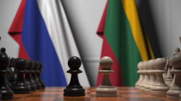 Rysslands och Litauens flaggor bakom spelbrickor på schackbrädet. Schackspel eller politisk rivalitet relaterad till 3D-rendering — Stockfoto