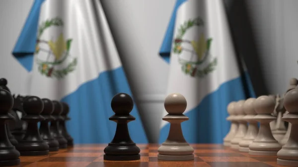 Juego de ajedrez contra banderas de Guatemala. Competencia política relacionada con la representación 3D —  Fotos de Stock