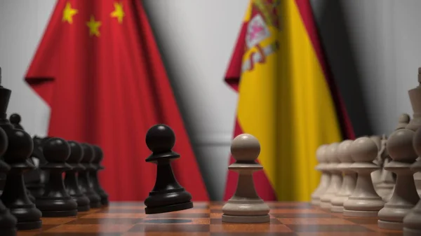 Jeu d'échecs contre les drapeaux de Chine et d'Espagne. Compétition politique liée au rendu 3D — Photo