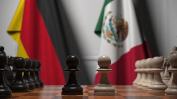Σκάκι παιχνίδι εναντίον σημαίες της Γερμανίας και του Μεξικού. 3d απόδοση σχετική με τον πολιτικό ανταγωνισμό — Φωτογραφία Αρχείου