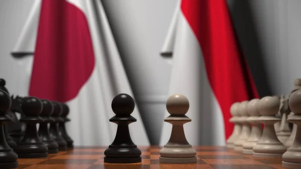 Partita a scacchi contro le bandiere di Giappone e Indonesia. Rendering 3D correlato alla competizione politica — Foto Stock