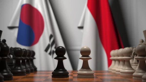 Partita a scacchi contro le bandiere di Corea e Indonesia. Rendering 3D correlato alla competizione politica — Foto Stock