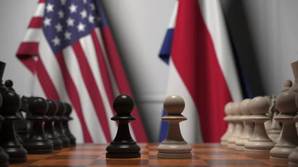 Прапори Уси і Коста-Рики за пішаками на шаховій дошці. Шахова гра або політичне суперництво пов'язують 3d рендеринг — стокове фото