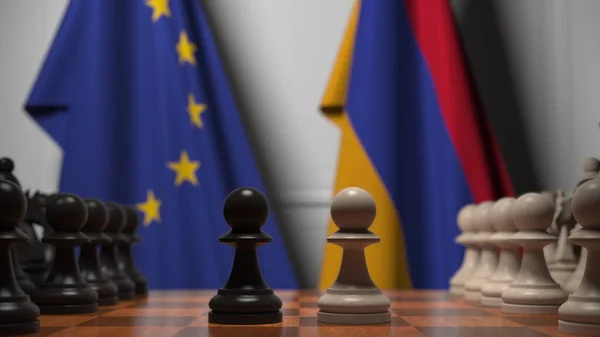 Bandiere dell'UE e dell'Armenia dietro pedine sulla scacchiera. Rendering 3D relativo alla partita a scacchi o alla rivalità politica — Foto Stock