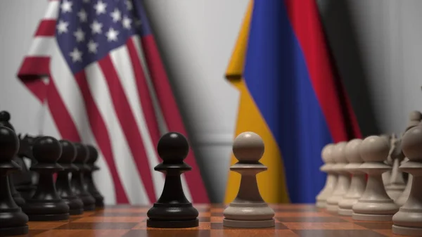 Az USA és Örményország zászlói gyalogok mögött a sakktáblán. Sakk játék vagy politikai rivalizálás kapcsolódó 3d renderelés — Stock Fotó