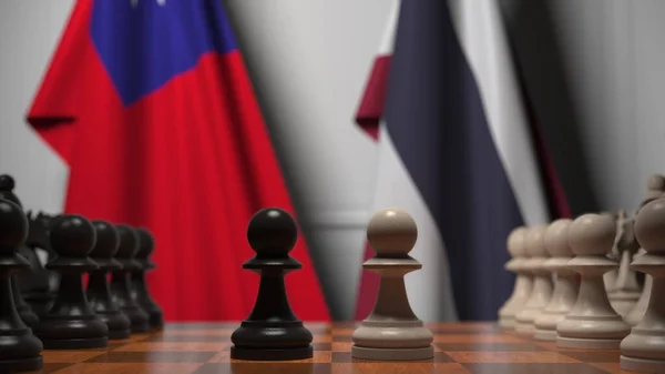 Tajvan és Thaiföld zászlói gyalogok mögött a sakktáblán. Sakk játék vagy politikai rivalizálás kapcsolódó 3d renderelés — Stock Fotó