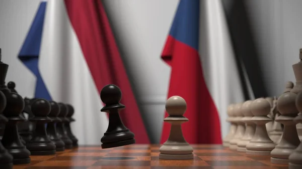 Σημαίες της Ολλανδίας και της Τσεχίας πίσω από πιόνια στη σκακιέρα. Σκάκι παιχνίδι ή πολιτική αντιπαλότητα που σχετίζονται 3d απόδοση — Φωτογραφία Αρχείου