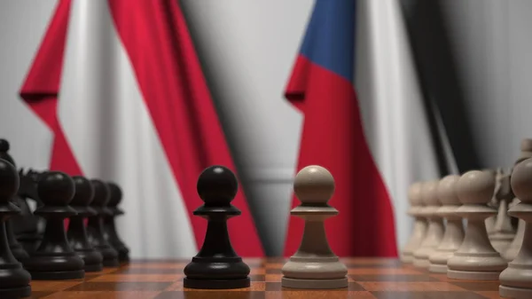 Прапори Австрії та Чеської Республіки стоять за пішаками на шахівниці. Шахова гра або політичне суперництво пов'язують 3d рендеринг — стокове фото