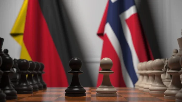 Drapeaux de l'Allemagne et de la Norvège derrière des pions sur l'échiquier. Jeu d'échecs ou rivalité politique liée au rendu 3D — Photo