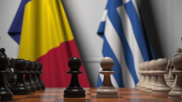 Прапори Румунії та Греції за пішаками на шаховій дошці. Шахова гра або політичне суперництво пов'язують 3d рендеринг — стокове фото