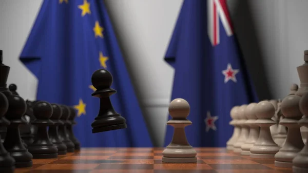 Flaggen der Europäischen Union und Neuseeland hinter Bauern auf dem Schachbrett. Schachspiel oder politische Rivalität im Zusammenhang mit 3D-Darstellung — Stockfoto