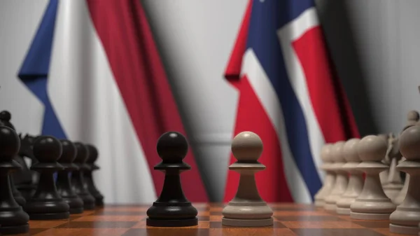 Flaggen der Niederlande und Norwegens hinter Bauern auf dem Schachbrett. Schachspiel oder politische Rivalität im Zusammenhang mit 3D-Darstellung — Stockfoto