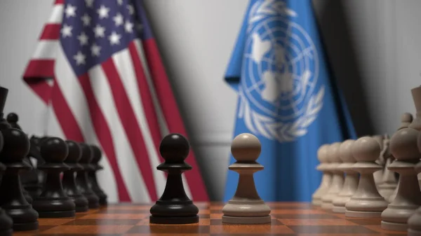 미국 과 유엔의 깃발 이 체스 판의 졸 뒤에 있습니다. 체스 게임이나 정치적 라이벌은 3D 렌더링 과 관련 이 있다. — 스톡 사진