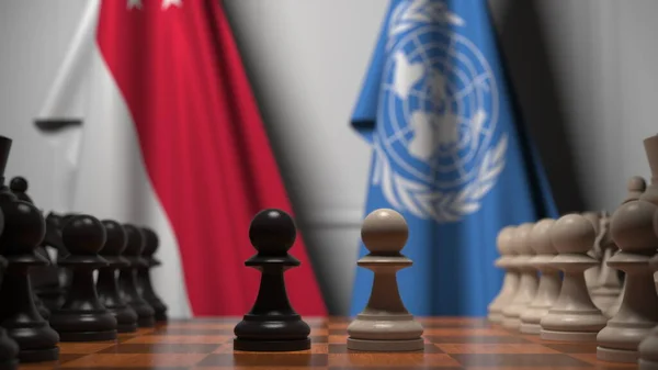 Singapur ve Birleşmiş Milletler bayrakları satranç tahtasındaki piyonların arkasında. Kavramsal 3d yorumlama — Stok fotoğraf