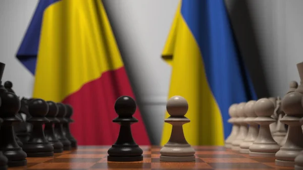 Flaggen Rumäniens und der Ukraine hinter Bauern auf dem Schachbrett. Schachspiel oder politische Rivalität im Zusammenhang mit 3D-Darstellung — Stockfoto