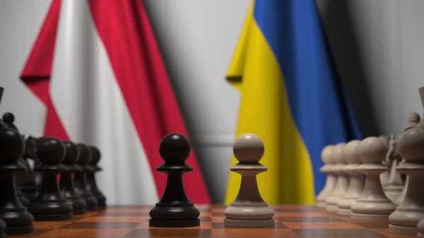 Флаги Австрии и Украины за пешками на шахматной доске. Шахматная игра или политическое соперничество — стоковое фото